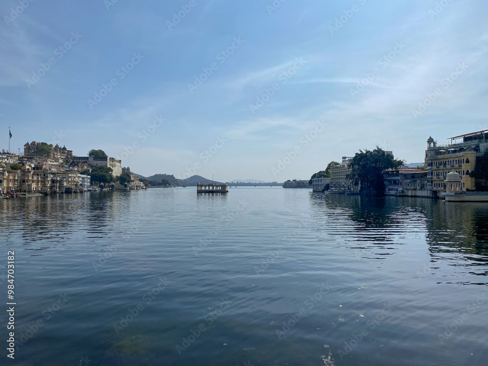 View of still water with indian buildings on periphery View of still water with indian buildings on periphery