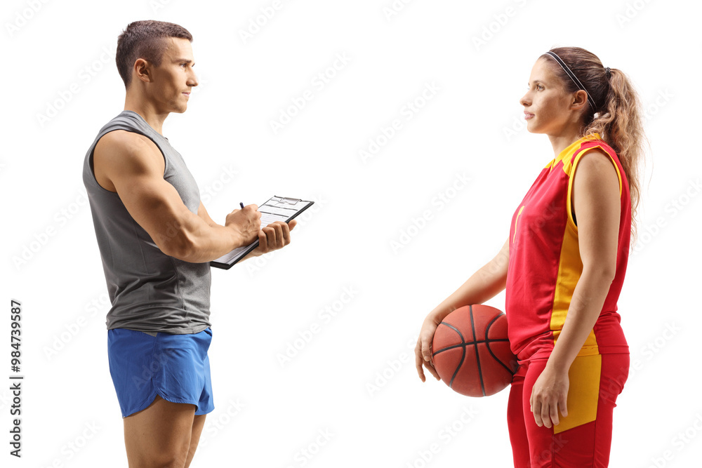 Profile shot of a basketball coach talking to a female player Profile shot of a basketball coach talking to a female player