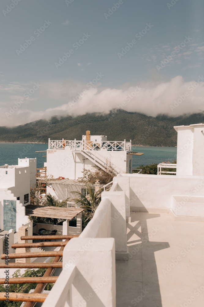 Fototapeta premium Greek house, brazilian greece. White houses on the sea in Arraial do Cabo RJ