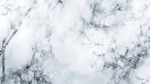 Elegant gray and white marble texture with subtle veining, perfect for backgrounds or interior design.