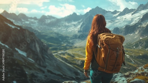 A young woman with long red hair stands in awe of a breathtaking mountain landscape, wearing a yellow jacket and carrying a brown backpack.