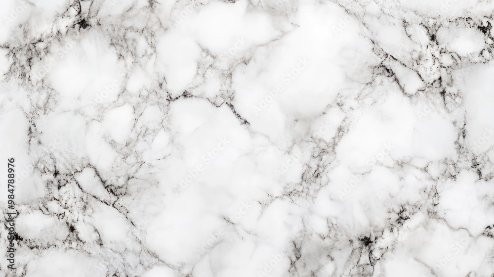 Elegant white marble texture with delicate gray veining, perfect for backgrounds and interior design. Elegant white marble texture with delicate gray veining, perfect for backgrounds and interior design.