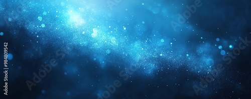 Stunning abstract blue background with light particles and bokeh effects, ideal for technology and science themes.