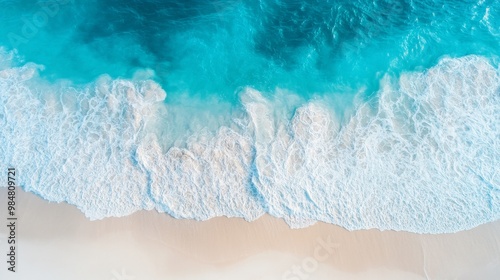 Stunning aerial view of a sandy beach and a clear blue sea during the day