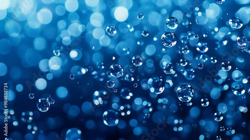 An abstract background with a blur of blue lights and floating bubbles, symbolizing purity, serenity, and the beauty of nature.