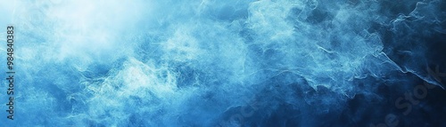 An abstract background featuring swirling blue smoke, creating a serene and mysterious atmosphere for creative projects.