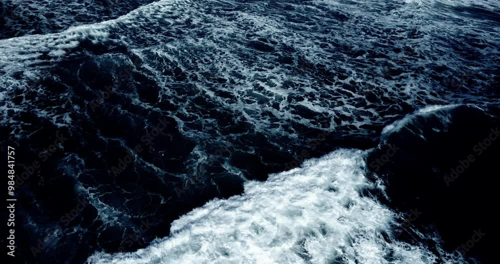 Top-view sea waves (Big power sea ocean wave Dark blue) Cinematic scene aerial view drone flying top-down of sea water big wave. Shot on cinema cam. DCI4K 4096x2160p. High quality footage ProRes422