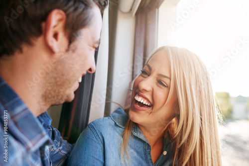 Wallpaper Mural Home, window and couple with affection, laughing and bonding of people, relationship and romance in morning. House, man and woman in weekend, hug and fun in marriage, together and happy with embrace Torontodigital.ca