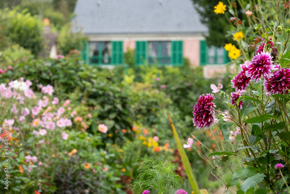 Naklejka premium Colourful flowers in the garden at the impressionist painter, Claude Monet's house in Giverny, France. 