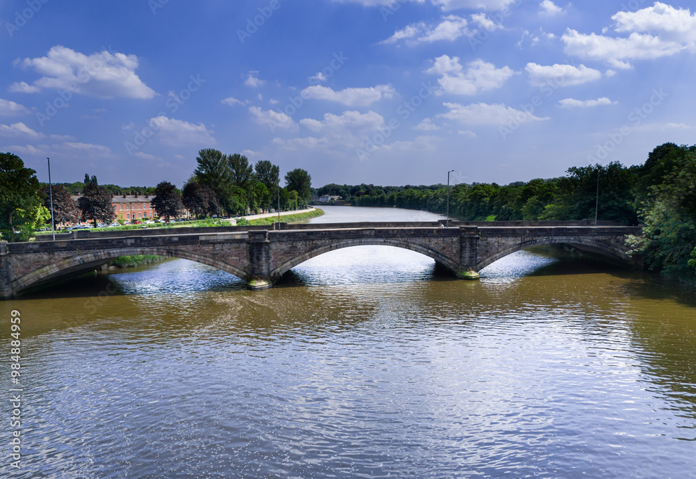 low level aerial view of the old stone arched bridge over the River Ribble on Liverpool Road into Preston City Centre, Lancashire, England low level aerial view of the old stone arched bridge over the River Ribble on Liverpool Road into Preston City Centre, Lancashire, England