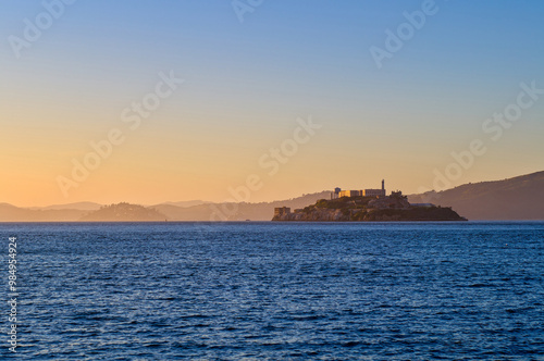 Sunset over Alcatraz Island in San Francisco Bay photo