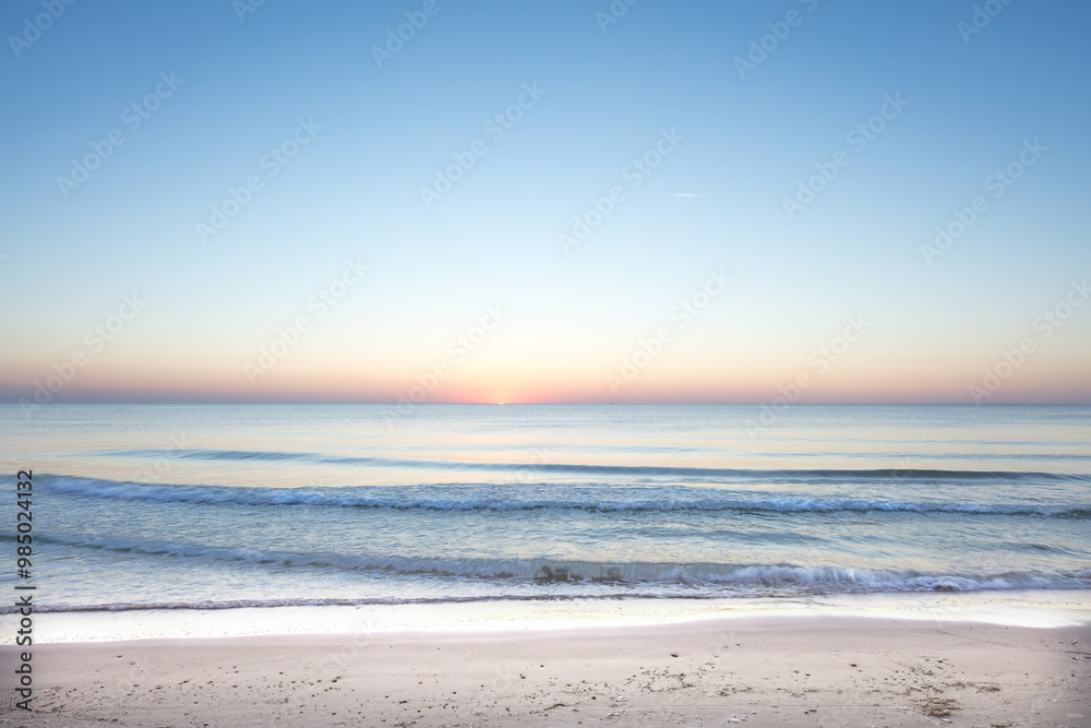Obraz premium Landscape, beach and horizon with blue sky, sand and clouds for tropical holiday, nature and travel. Sea, water and waves outdoor in summer sunshine for luxury vacation, tourism and ocean in Ibiza