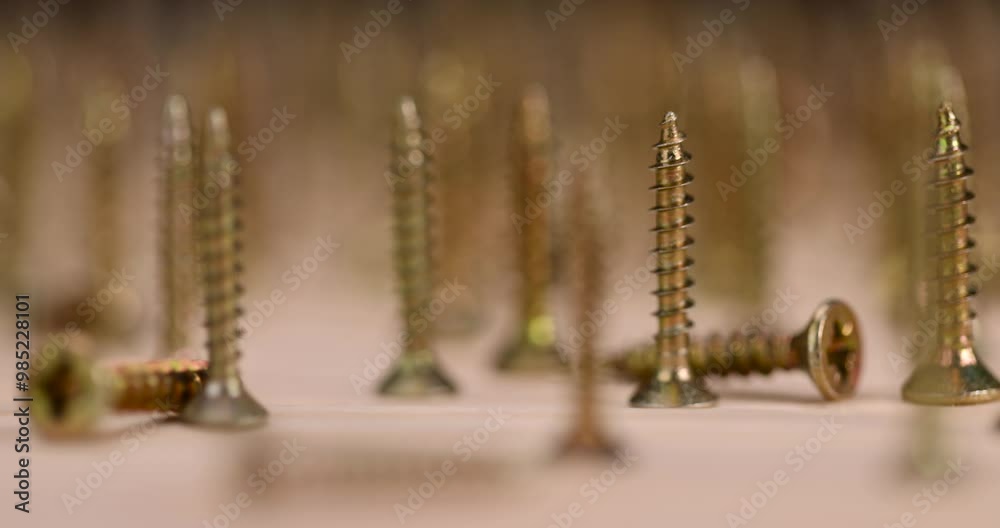 golden self-tapping screws for installation and construction work with wood, yellow metal self-tapping screws for fixing wooden boards and other wood products golden self-tapping screws for installation and construction work with wood, yellow metal self-tapping screws for fixing wooden boards and other wood products