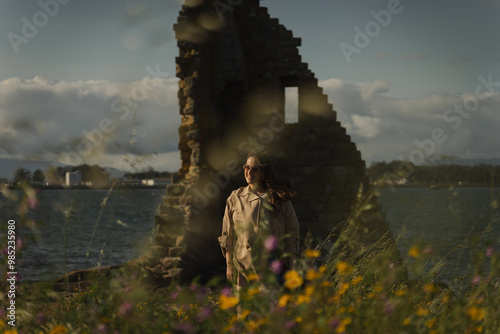 Woman posing in front of San Sadurniño tower photo