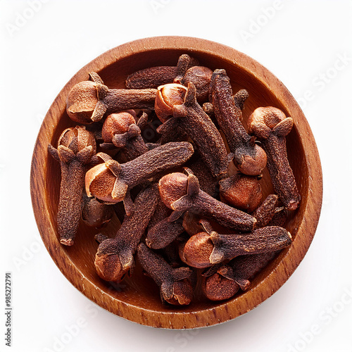 cloves on a plate. isolated on white background.  studio shot, top view. photo