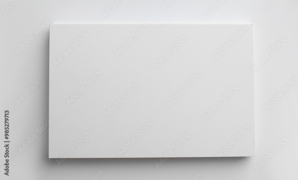 Blank business cards on light grey background, top view. Mockup for design Blank business cards on light grey background, top view. Mockup for design