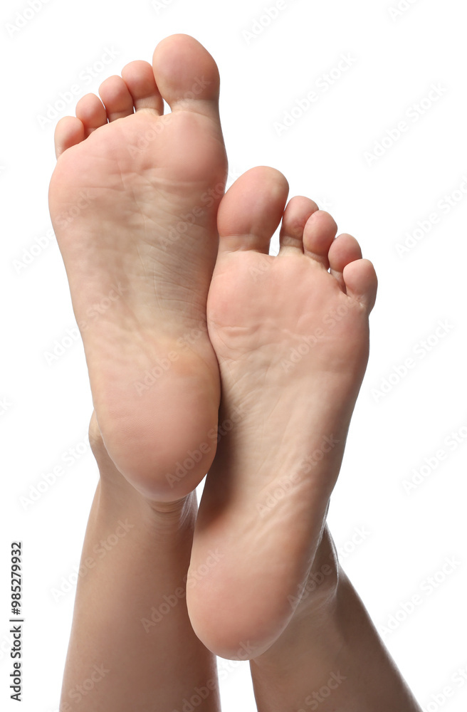 Barefoot woman on white background, closeup view