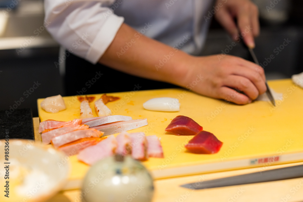Japanese chef prepare for sashimi in restaurant Japanese chef prepare for sashimi in restaurant
