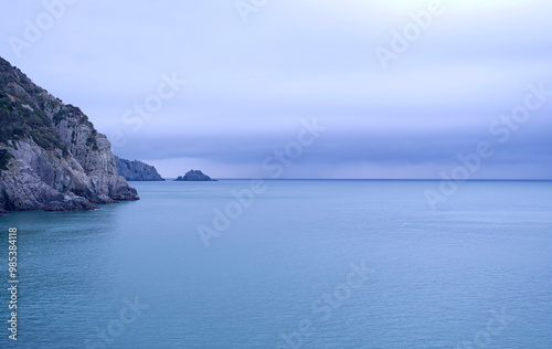 Rocks and coast of Gageodo Island against cloudy sky and horizon of the sea near Sinan-gun, South Korea