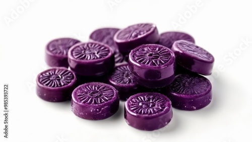  Vibrant purple candies with intricate designs photo