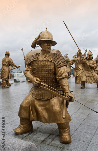 Tongyeong-si, Gyeongsangnam-do, South Korea - August 9, 2018: Bronze statue of navy soldiers that reproduces Hansan Daecheop at Hansan Daecheop Military Ship Plaza photo