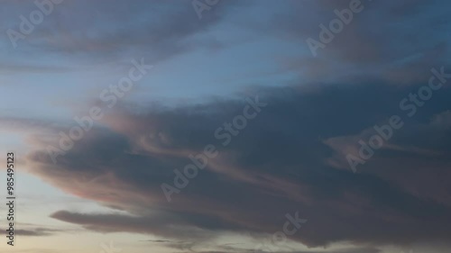 Abstract Building motions clouds sunset sky. The sun is going down of time-lapse. slow moving clouds. B Roll of timelapse sunset sky. Nature Background Environment Abstract. Freedom Backgrounds.
