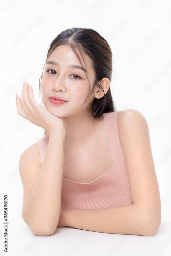 Young beauty Asian woman with natural beauty make up style shows healthy and perfect skin on isolated background. Facial and skin care concept for commercial advertising. Young beauty Asian woman with natural beauty make up style shows healthy and perfect skin on isolated background. Facial and skin care concept for commercial advertising.