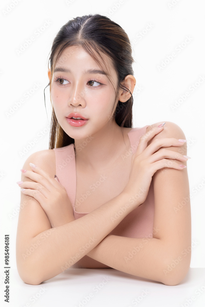 Young beauty Asian woman with natural beauty make up style shows healthy and perfect skin on isolated background. Facial and skin care concept for commercial advertising. Young beauty Asian woman with natural beauty make up style shows healthy and perfect skin on isolated background. Facial and skin care concept for commercial advertising.