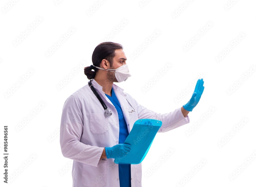 Young male medic in coronavirus concept isolated on white Young male medic in coronavirus concept isolated on white