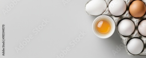 A flat lay of a breakfast setup, with a recyclable egg carton prominently featured, highlighting eco-friendly choices in daily life photo