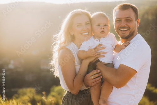 Happy Family Enjoying a Sunny Day Outdoors in Beautiful Natural Setting