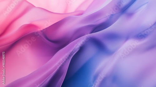 A captivating abstract background showcases a seamless blend of purple, pink, and blue shades. The soft textures add depth, inviting creative interpretations