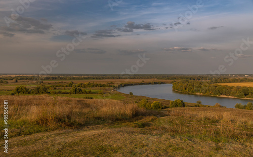 A beautiful landscape with a river running through it