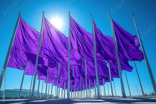 Colorful Display of Purple Flags Against a Clear Sky in a Vibrant Outdoor Setting for Celebration photo