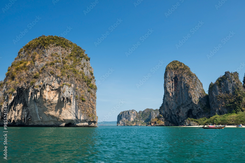 Fototapeta premium Limestome mountains at Pranang Cave Beach, Railay, Krabi, Thailand