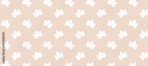 White autumn leaves in the brown background