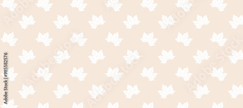 White autumn leaves in the beige background