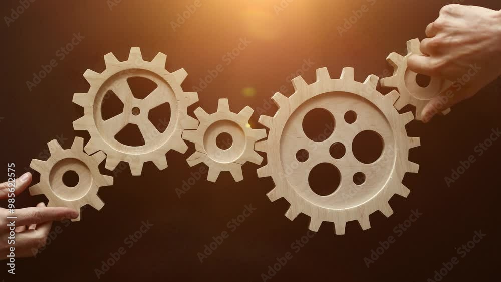 handshake on the background of a wooden mechanism. Black chalk board. handshake on the background of a wooden mechanism. Black chalk board.