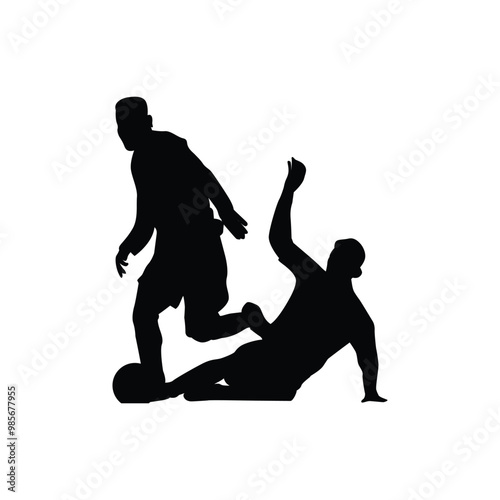 Silhouettes of dueling football players tackling the ball

