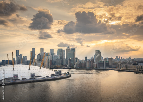 The skyline of Canary Wharf and the O2 taken from the cable car at sunset