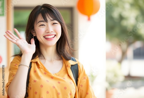 Energetic Japanese lady flashing a happy smile exuding confidenc photo