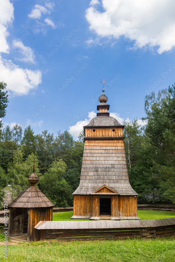 Little wooden church and surrounding wall in Nowy Sacz, Poland