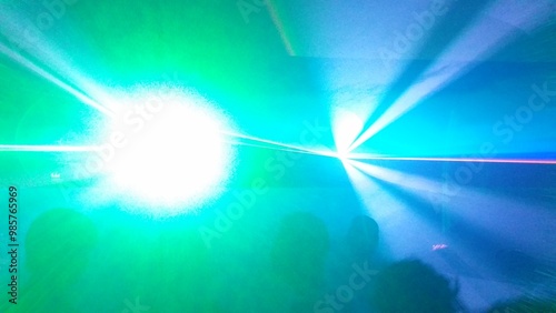Foto Clubbing Techno Rave in a Club Disco with immensive Light and Laser Show | Serie