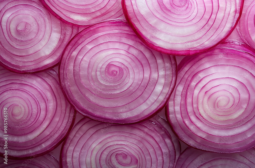 Close-up of sliced red onion highlighting the vibrant pink and purple hues Close-up of sliced red onion highlighting the vibrant pink and purple hues