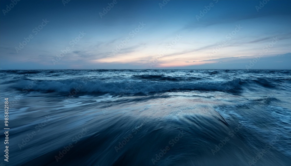 Fototapeta premium Calm ocean waves at twilight.