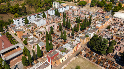 Aerial view of a Catholic Christian cemetery. There are many tombs and votive chapels.