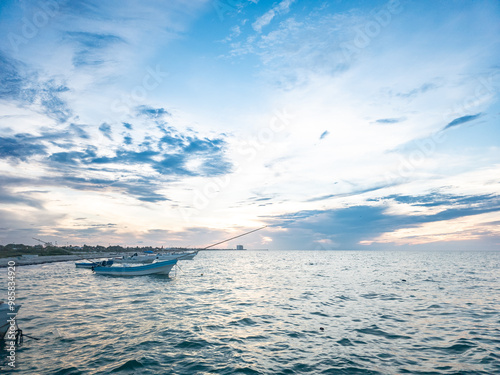 Small boat anchored at the seashore