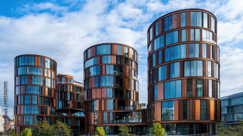 Copenhagen, Denmark. Five round towers make up Axel Towers. Contemporary Glass and Copper Office Buildings by Lundgaard and Tranberg Architects in Copenhagen, Denmark, across from Tivoli Gardens photo