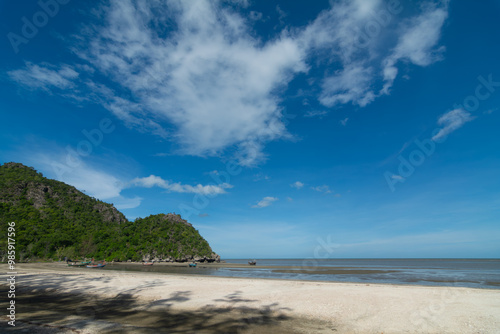 Sam Phraya Beach, Hua Hin, Thailand, a tropical coastline on the Gulf of Thailand, next to a mountain not far from the city.
