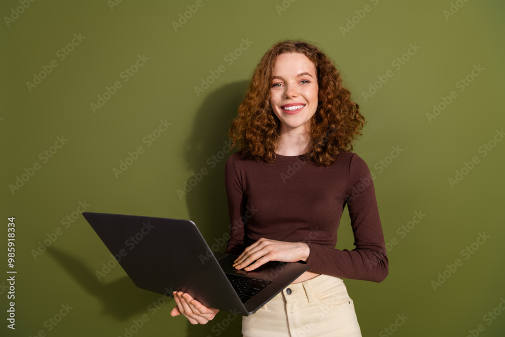 Photo of adorable lovely girl wear brown shirt chatting instagram twitter telegram facebook isolated khaki color background Photo of adorable lovely girl wear brown shirt chatting instagram twitter telegram facebook isolated khaki color background